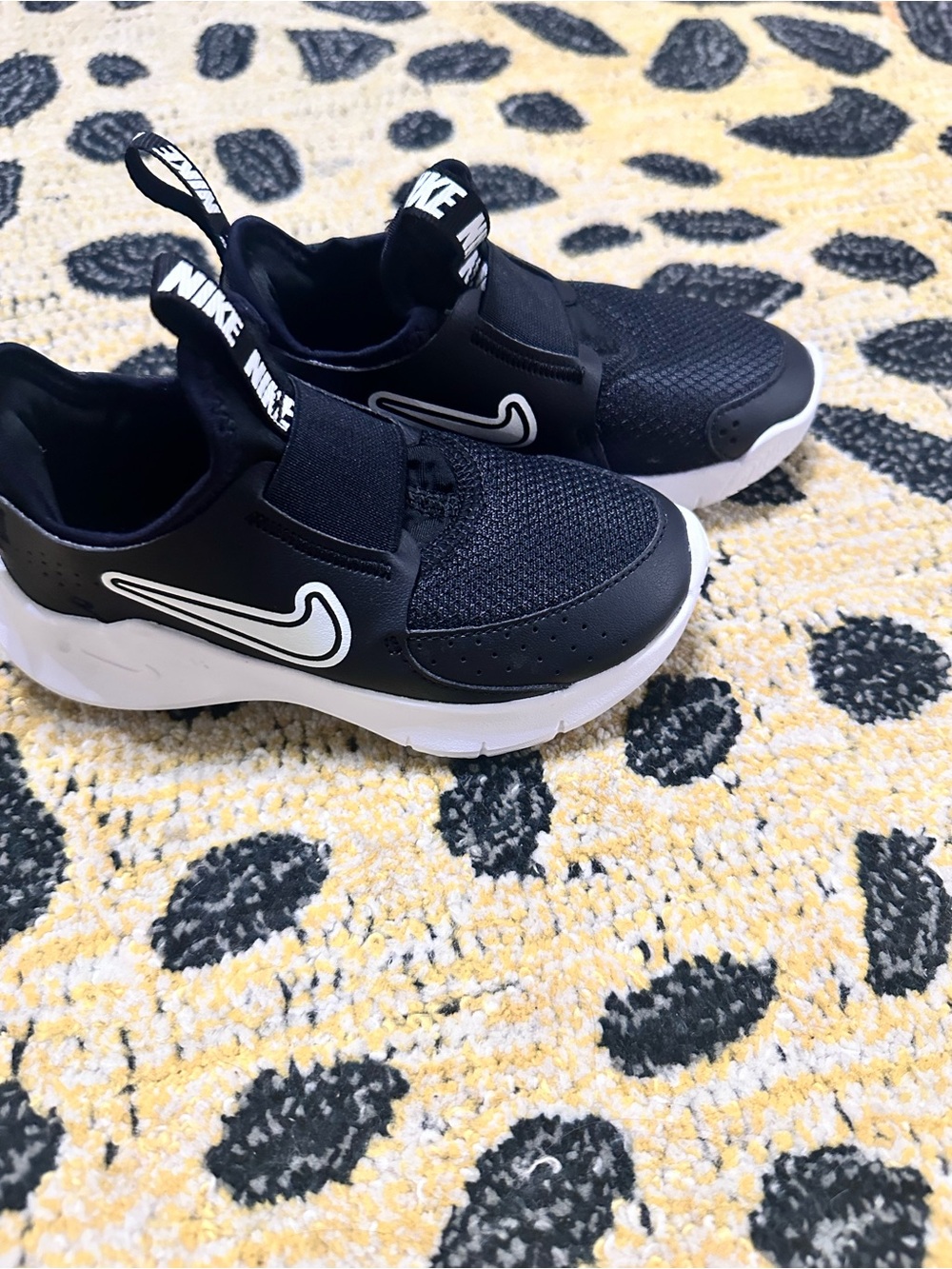 Nike Black and White Kids Slip-On Sneakers